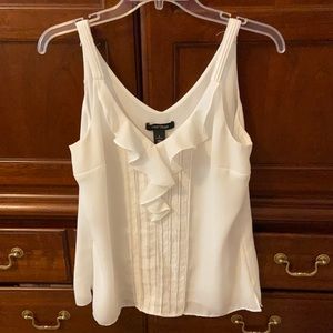 White sleeveless blouse. Ruffled and detailed front.  Lined. WHBM Small